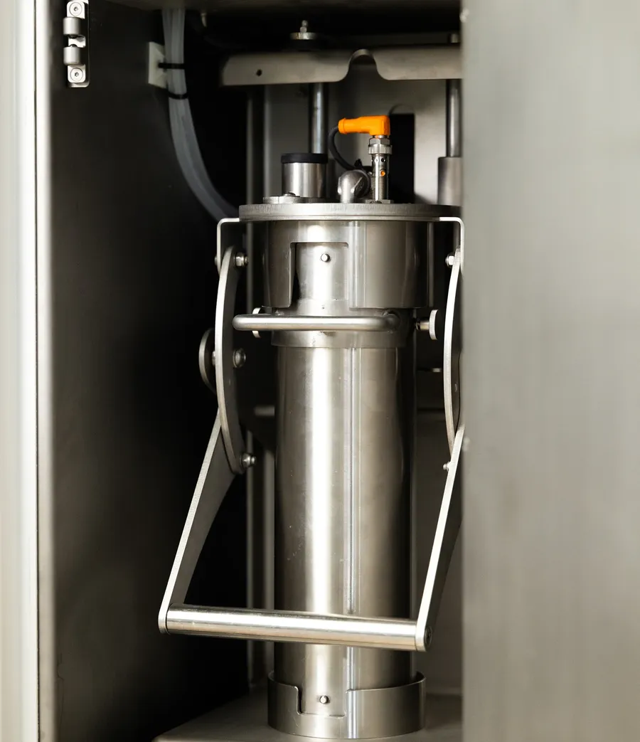 Stainless steel filter cartridge inside a Zereau cabinet